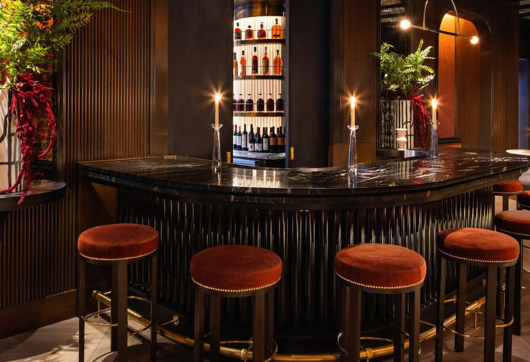 Demar Leather Nashville Dream hotel bar with stools in rust-colored suede