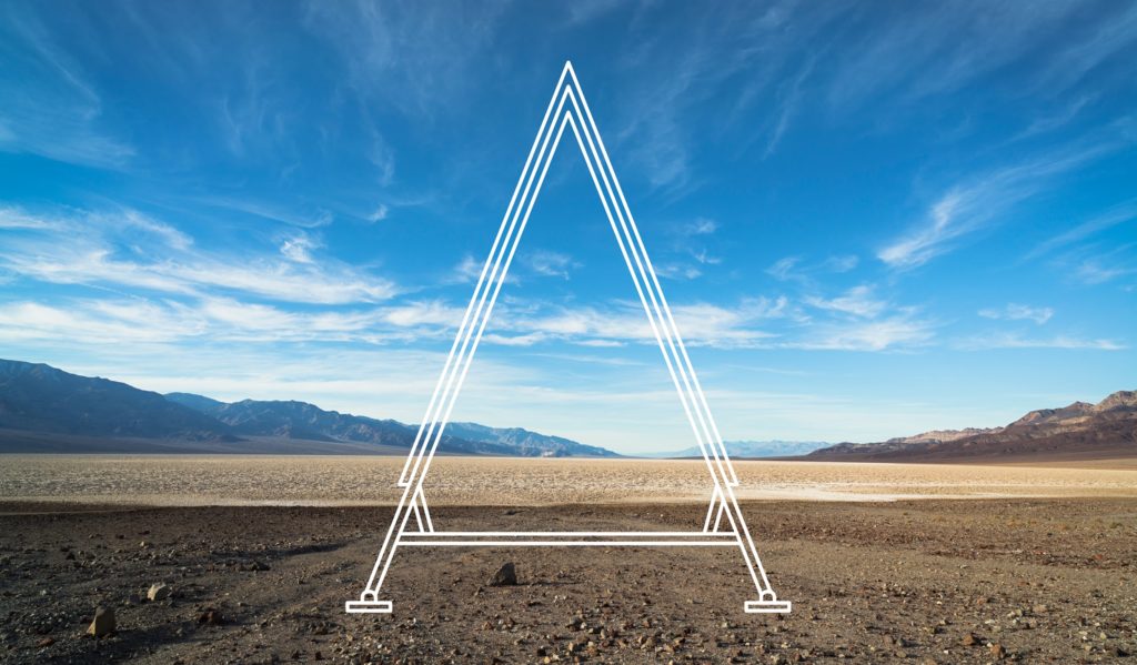 Zero Travel Nolla Cabin rendering of cabin as if superimposed upon a desert landscape with sky and mountains visible in the distance
