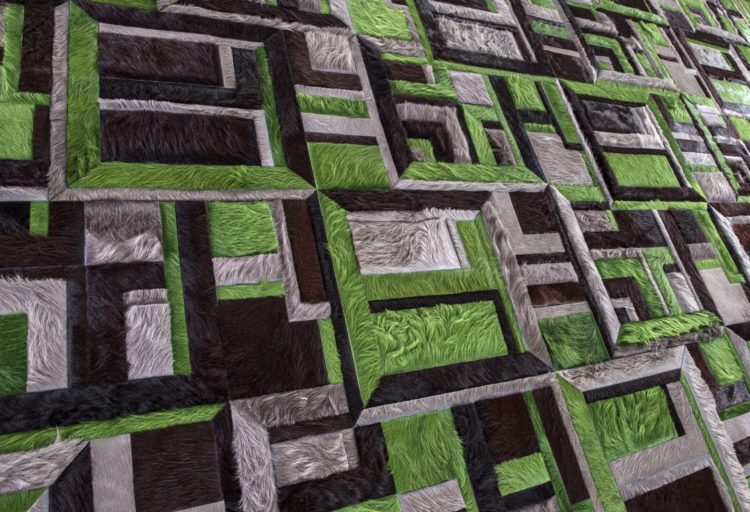 Kyle Bunting hide rugs Paragon design of intersecting rectangles in green, dark blue, gray