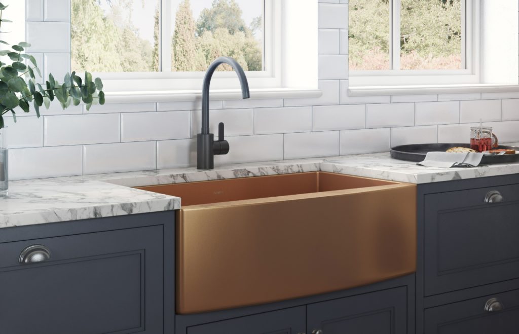Ruvati's Terraza Sinks copper view from front in kitchen with white and grey countertops and black cabinets