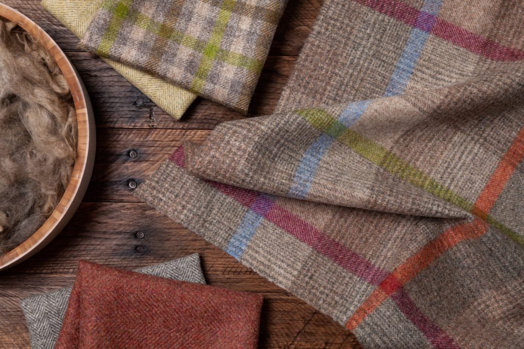 Architex Late Fall Collection Loom and Mercer collection detail of five fabrics on table