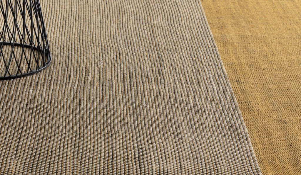Nanimarquina for Coalesse Mesh style two-tone outdoor rug with khaki and mustard colors
