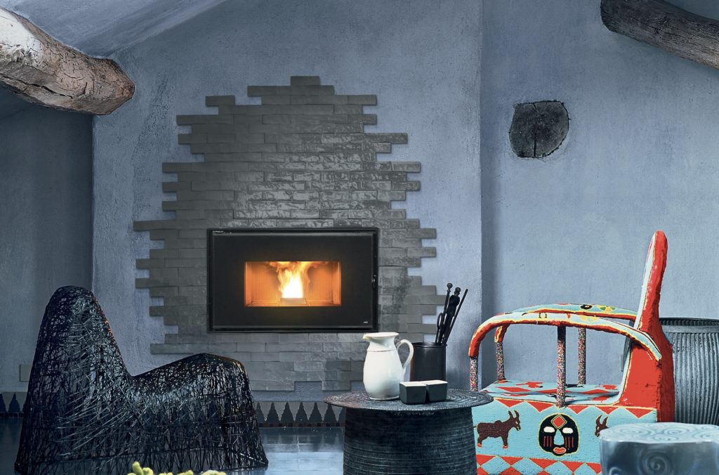 MCZ Sahara Fireplace Cladding shown in gray around inset fireplace in living room with Southwest decor