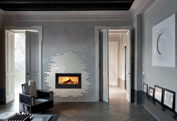 MCZ Sahara Fireplace Cladding shown around inset fireplace in living room in white