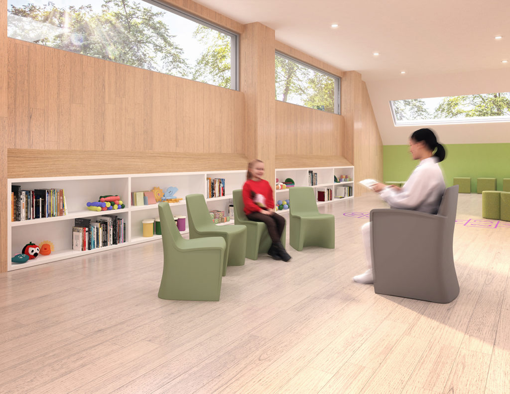 Hardi Children's many chairs in green and grey in school with teacher reading to a student