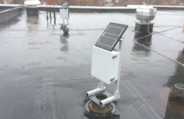 Hanging Gardens Green Roofs Blue Roof stormwater system with monitors on roof during rainfall 