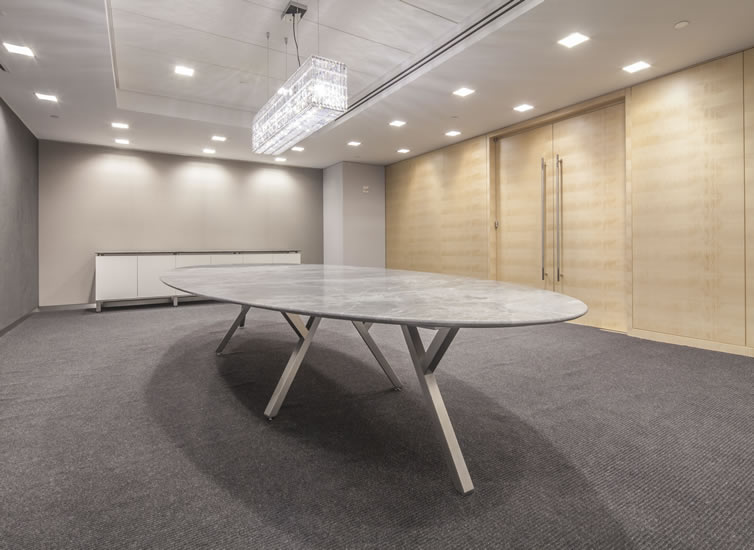 2Merge Table oval mottled white/gray stone top in conference room
