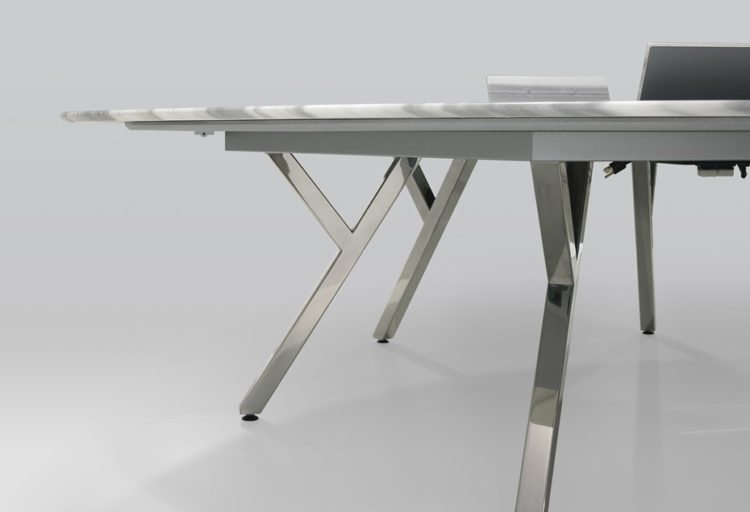 2Merge Table side view showing table base and thin edge of top with open laptop