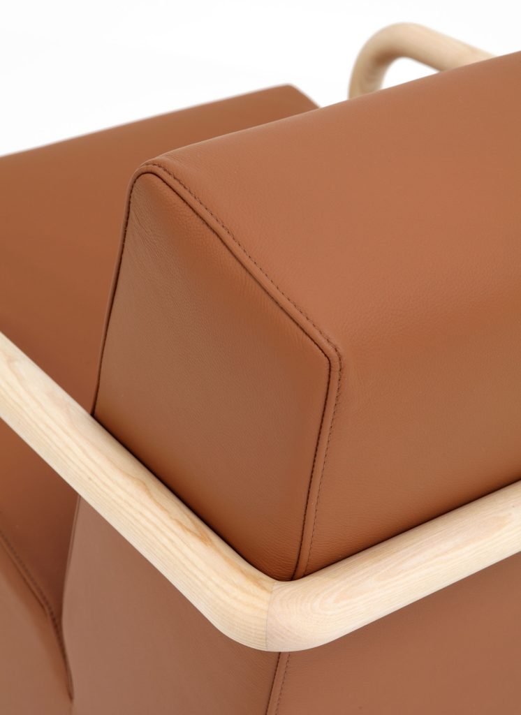 Porro Lullaby Armchair detail of back with rust upholstery