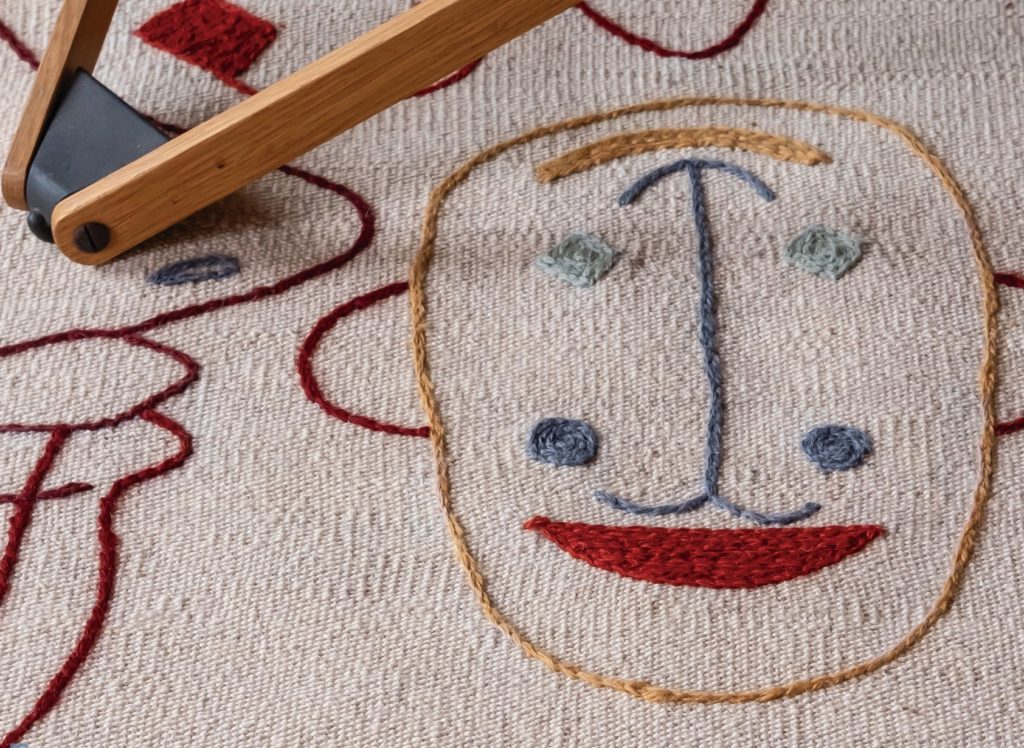 Nanimarquina Silhouette Rug close up showing face that looks like Salvador Dalí