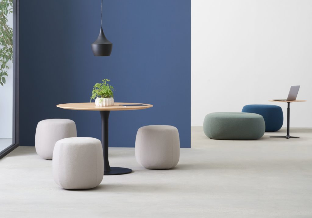 Rho Ottomans three single seat white and two larger green and blue with cafe tables