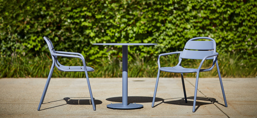 Landscape Forms 21 Chair two chairs in powder blue with café table