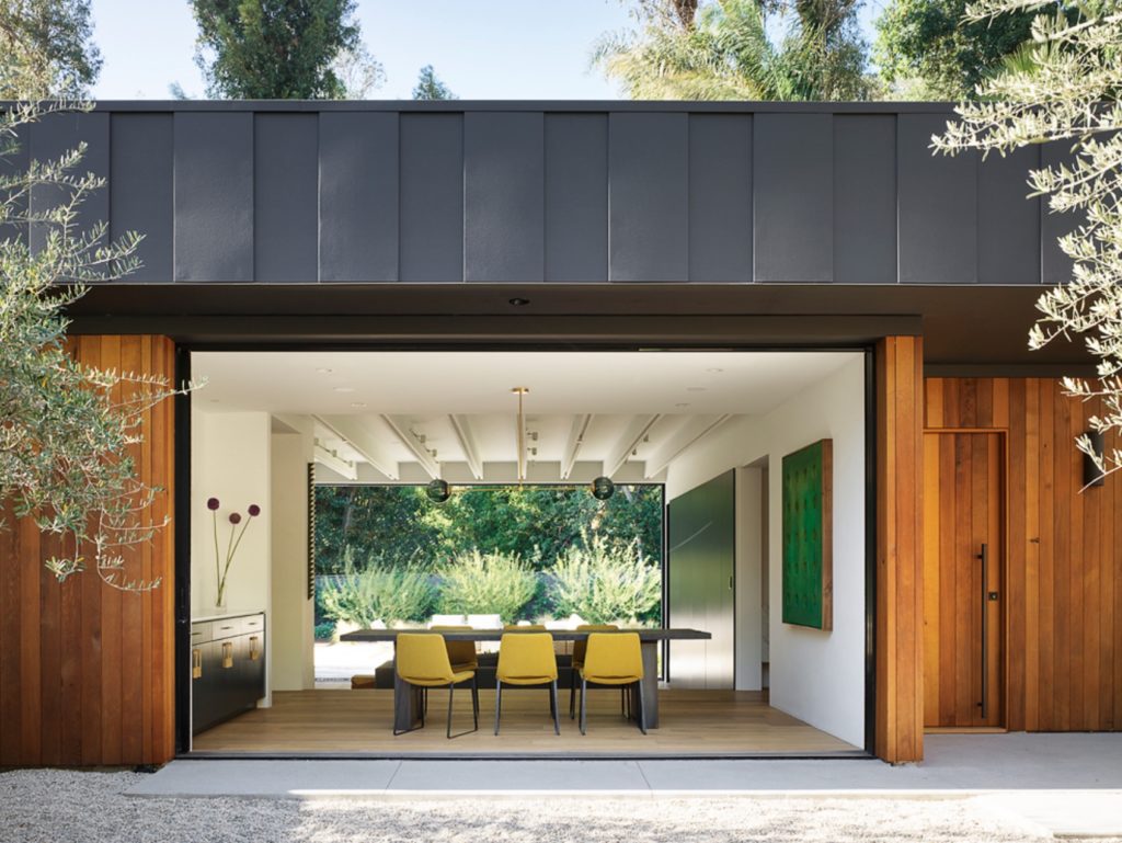 Assembledge+ Laurel Hills view from outside looking on dining area with open pocket door