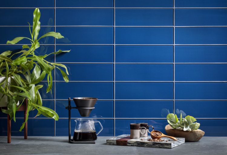 Smart Surfaces Island Stone rectangular tiles in deep blue in kitchen