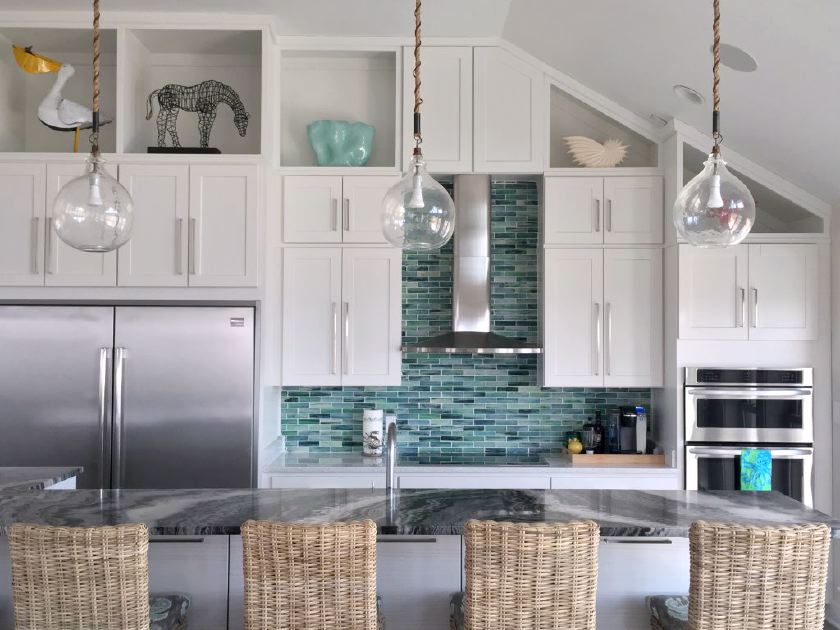 Smart Surfaces Lunada Bay tile backsplash variety of blues small rectangular tile in open kitchen