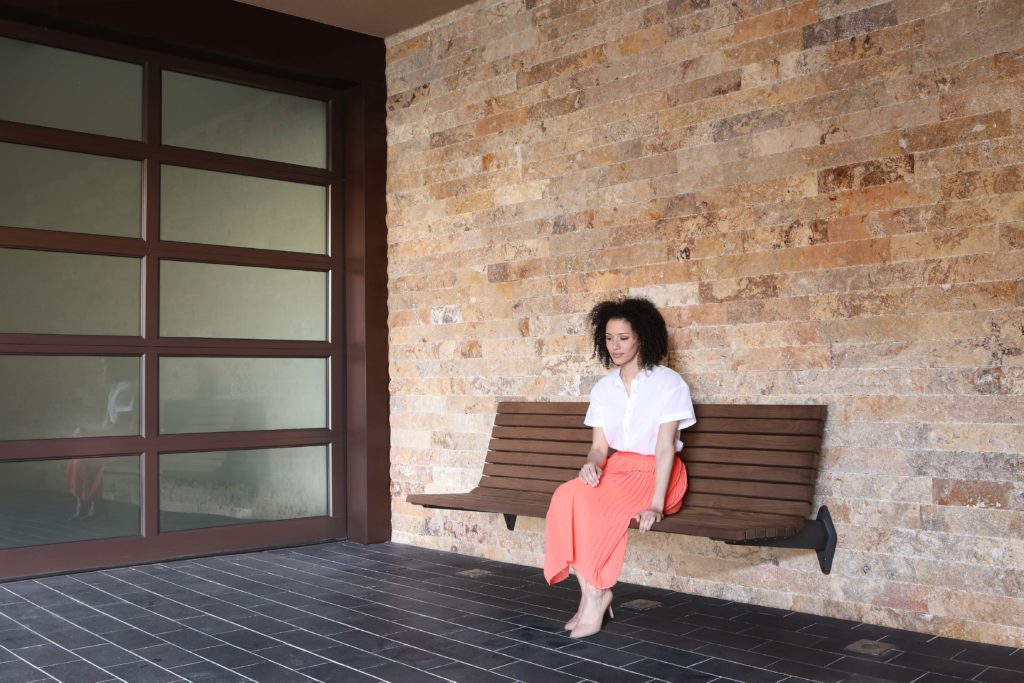 Generation 50 bench cantilever wall mounted with seated woman