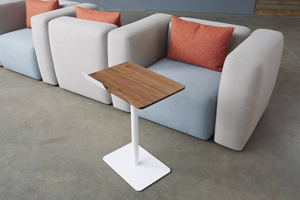 Hightower Kona Laptop Table dark wood with white paint in front of nice chairs