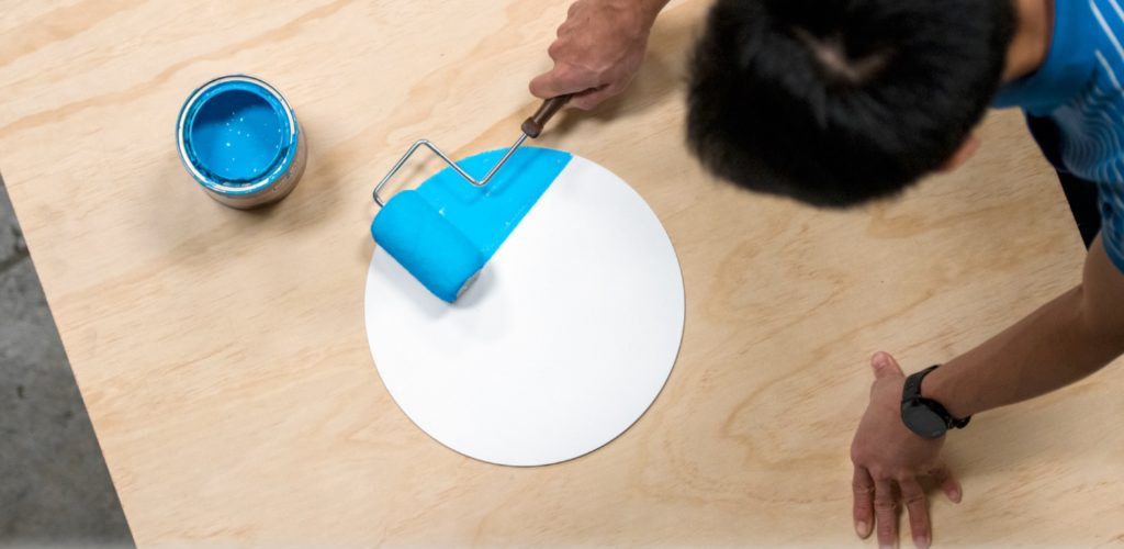 Ramen Wall Sconce white faceplate being painted blue
