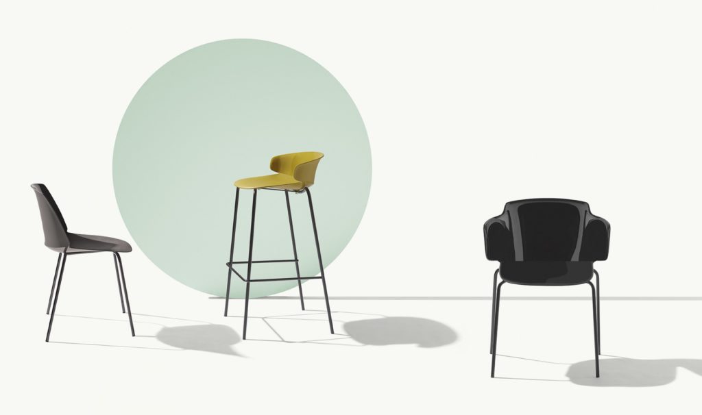 Classy Collection gray chair, black armchair, and yellow stool