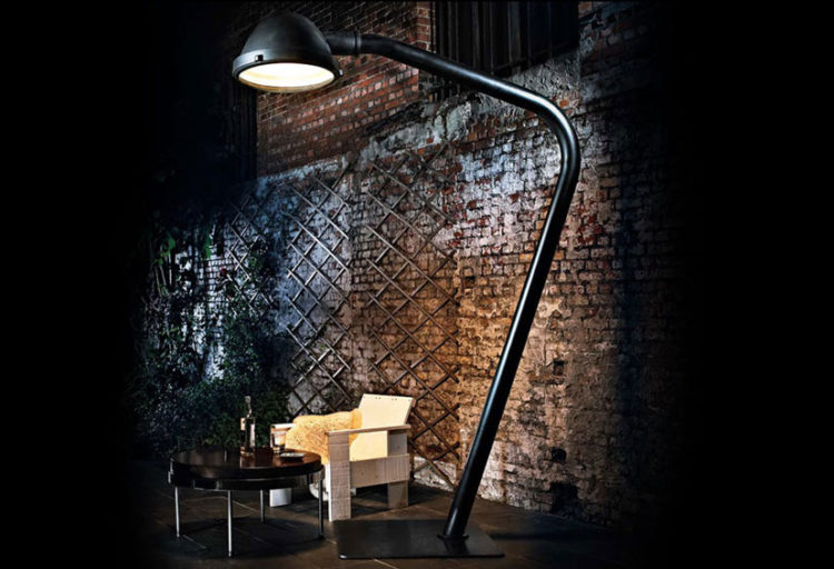 Global Lighting Outdoor floor lamp in front of brick wall