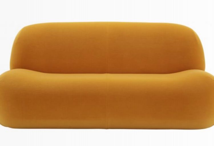 Ligne Roset's Pukka yellow sofa front view