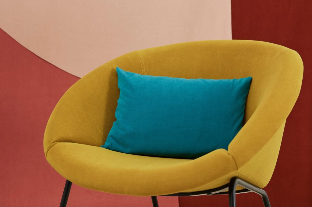 Camira’s Regent and Port mustard Regent on lounge chair