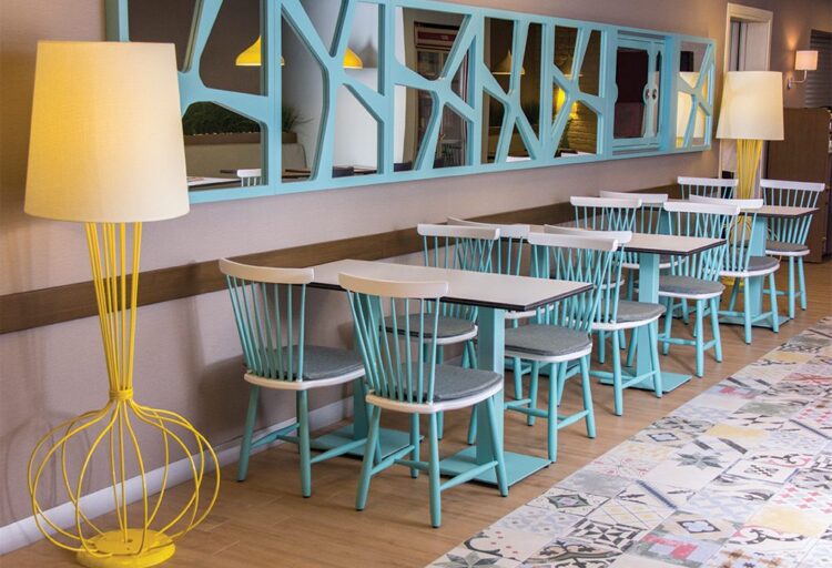 Tabletops by Sandalyeci streaked marble on tables in cafe