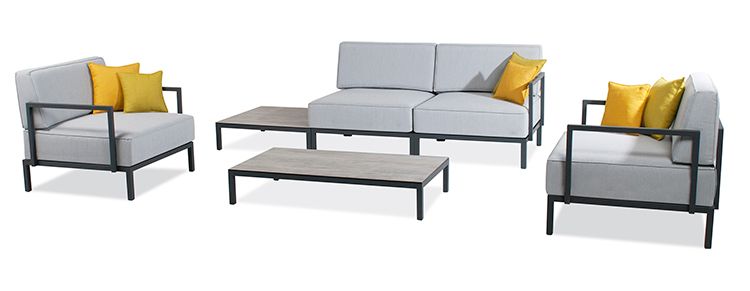 Beaufurn's Serene Seating chairs, loveseats, and tables in gray with yellow pillows