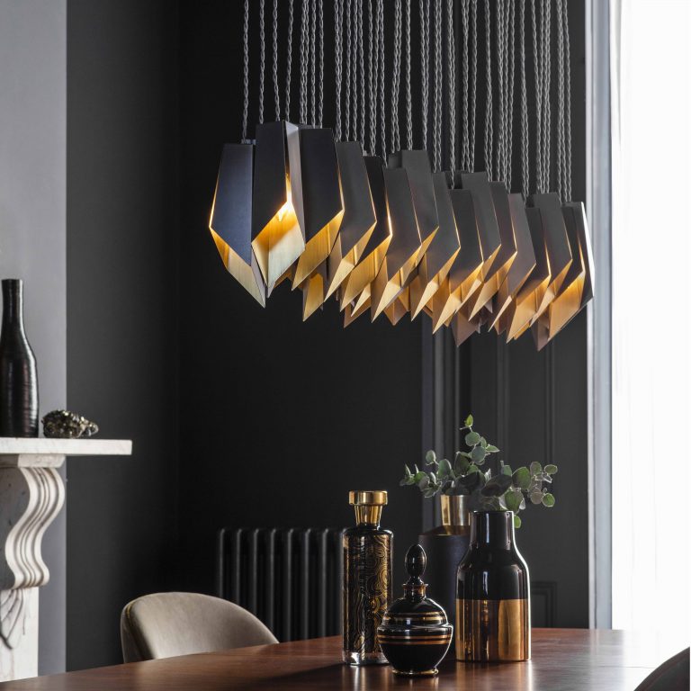 Tigermoth's Bronze Fold Linear Chandelier above kitchen table