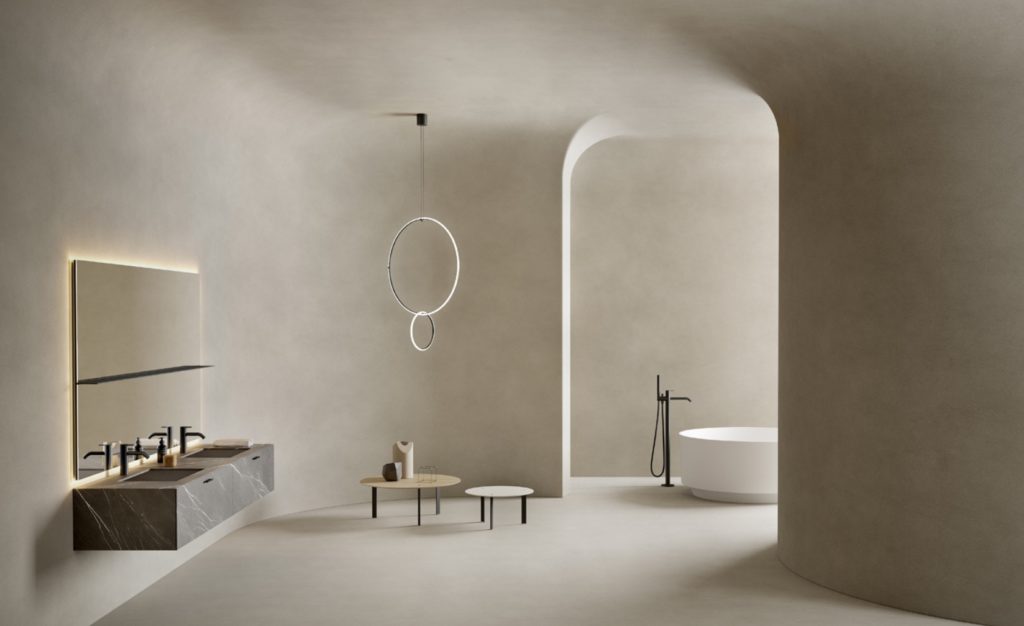 Inbani's Grate Collection double sinks with grate and tub in background