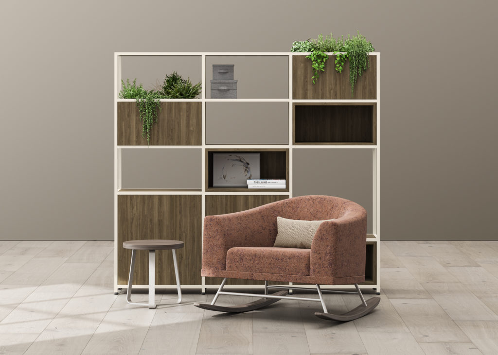 Eklund Lougne rocker in front of storage cabinet in brownis/pink color