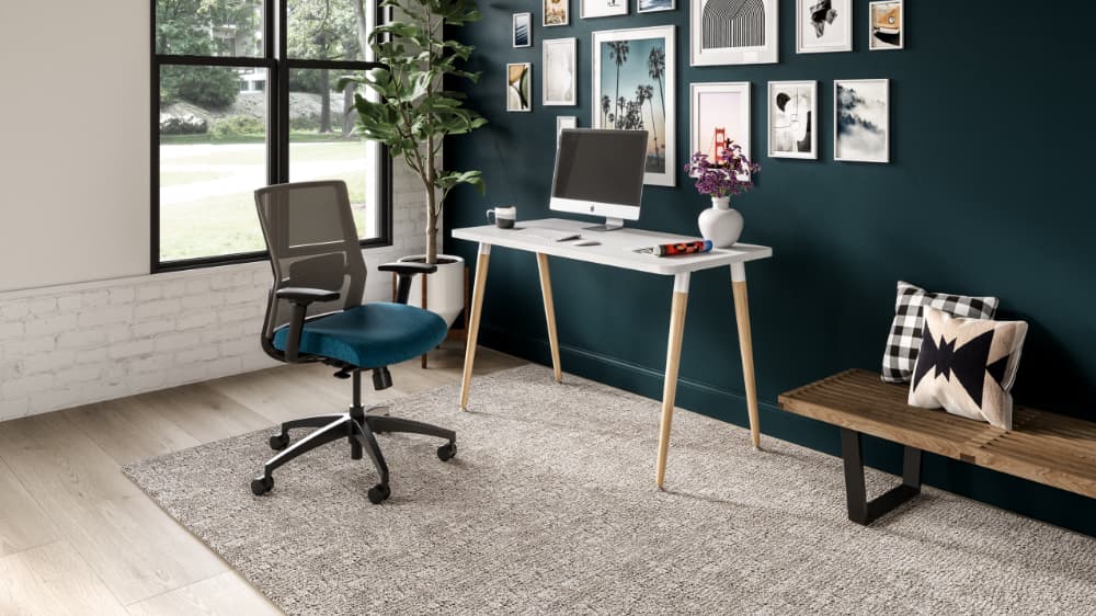 SitOnIt Reya Desk white top wooden legs with empty chair in office