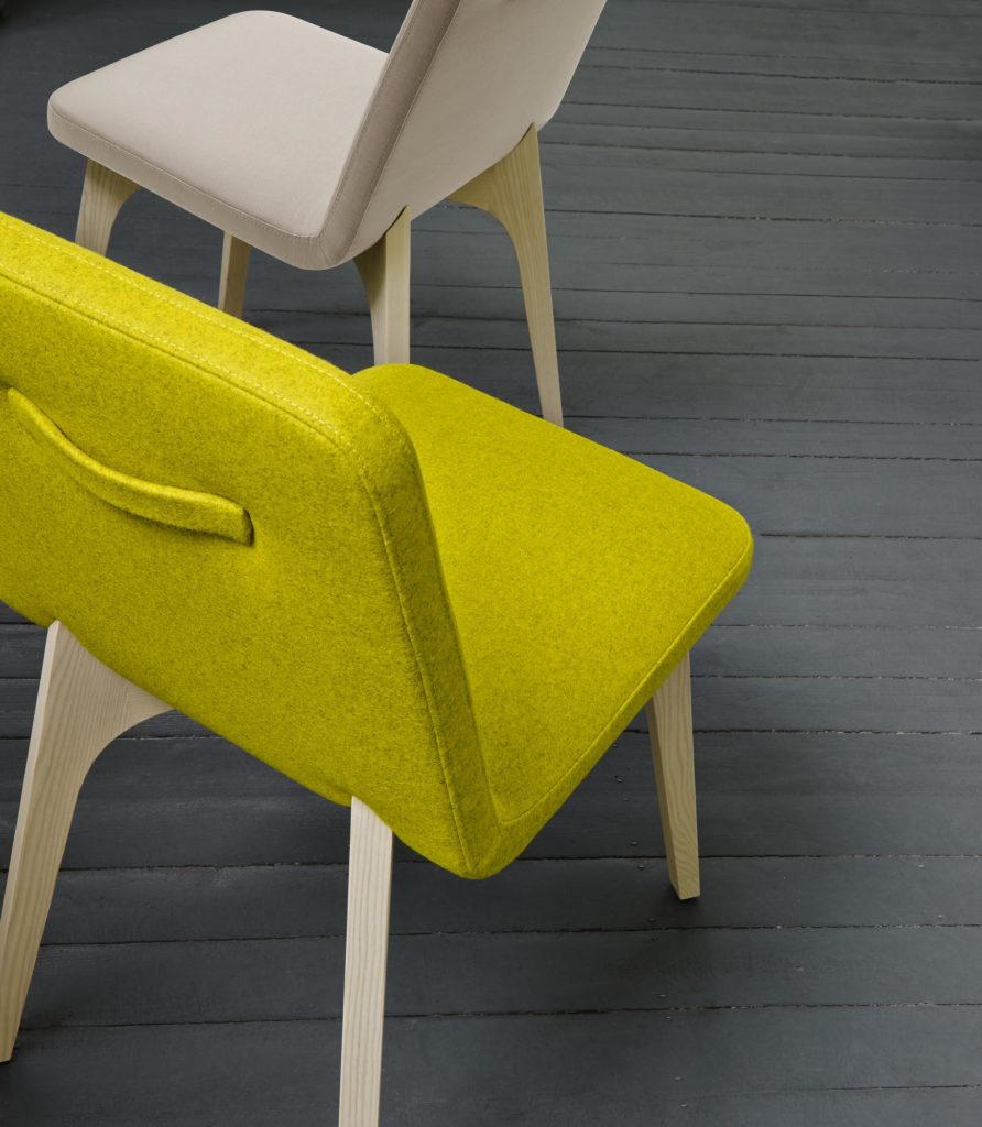 Vik 2 chair two chairs one with handle in light green other off white