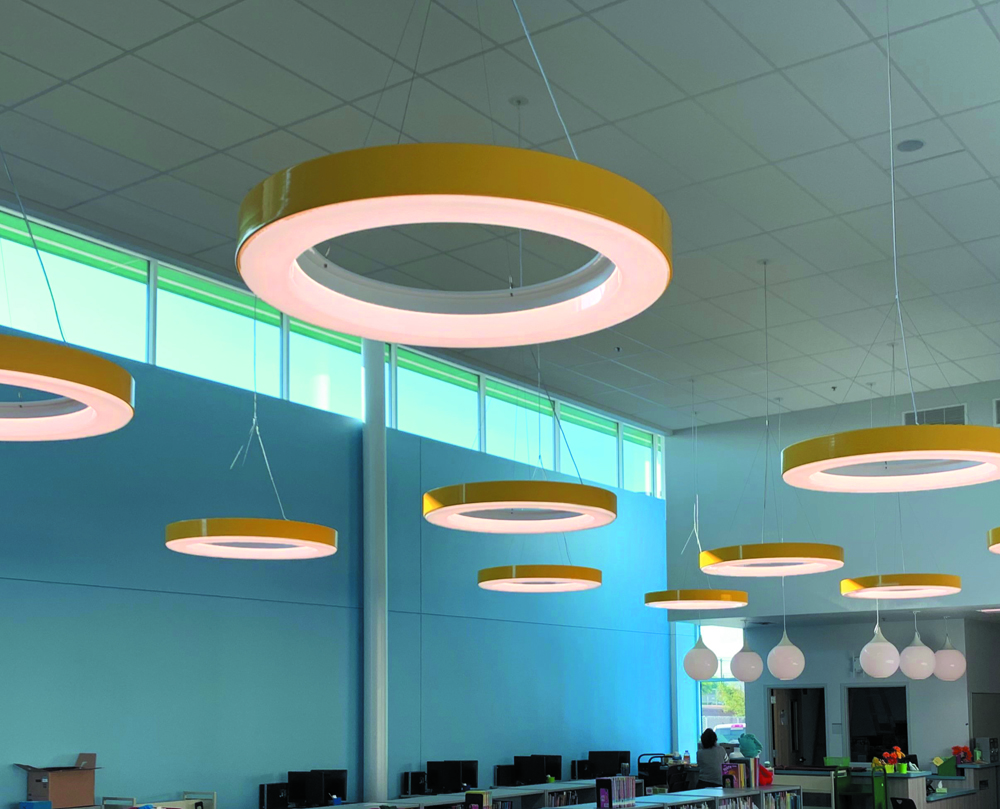 Impact Architectural Lighting wht.wal several fixtures in cafeteria