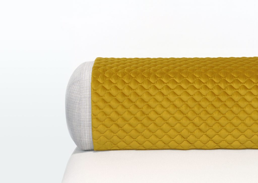 Elements detail with cushion and yellow blanket
