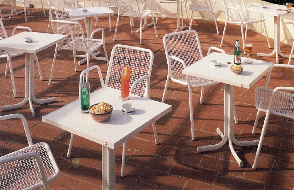Emu Rio R50 white chairs on patio