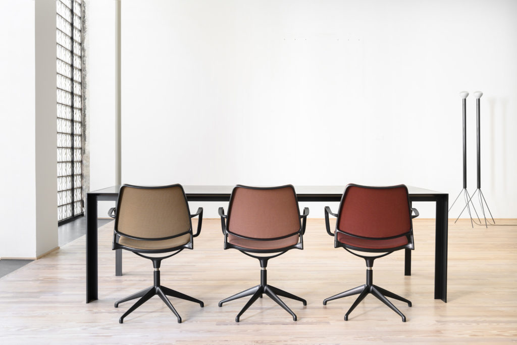Stua Gas Chair three chairs at table rear view