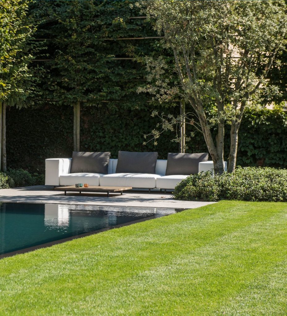 Extremis Walrus Sofa near pool gray cushions