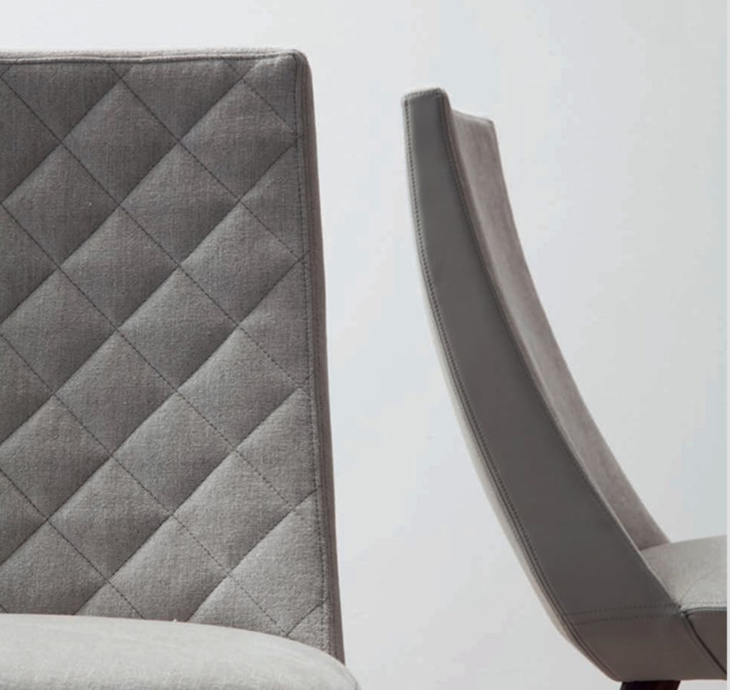 Beret by Sandler Seating detail of two chairs one with geometric styling