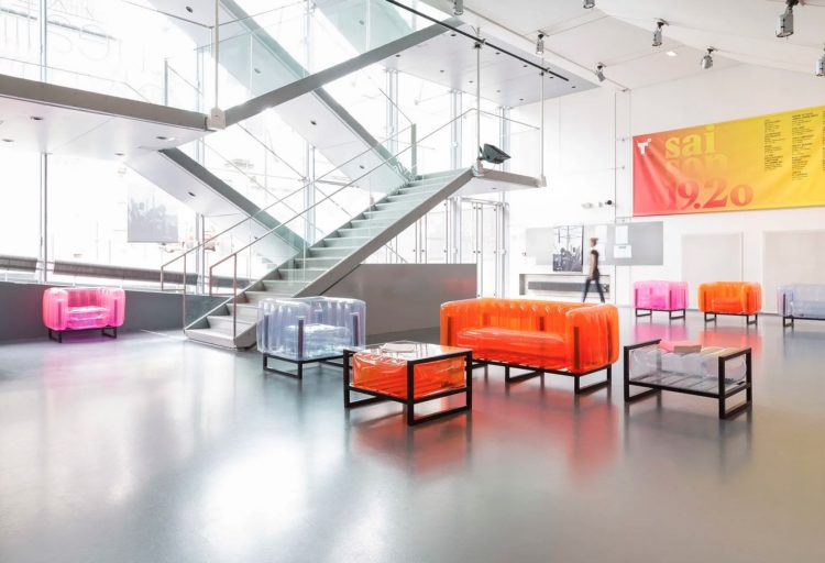 YOMI EKO daring seating several pieces in atrium of building