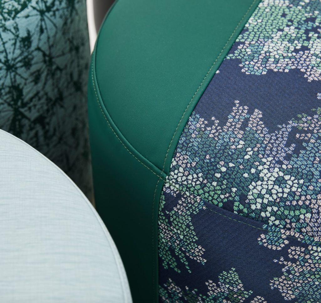 HBF Textiles Summer Fabrics parker and digital bloom blue and green on Ottoman