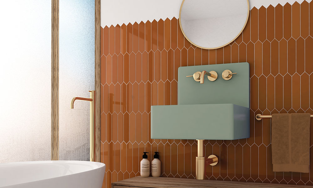 Arrow tile russet in bathroom with gray/green sink