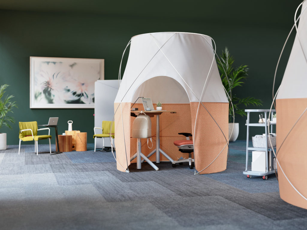 Steelcase Work Tent white and peach in room with chair, small table, and painting 
