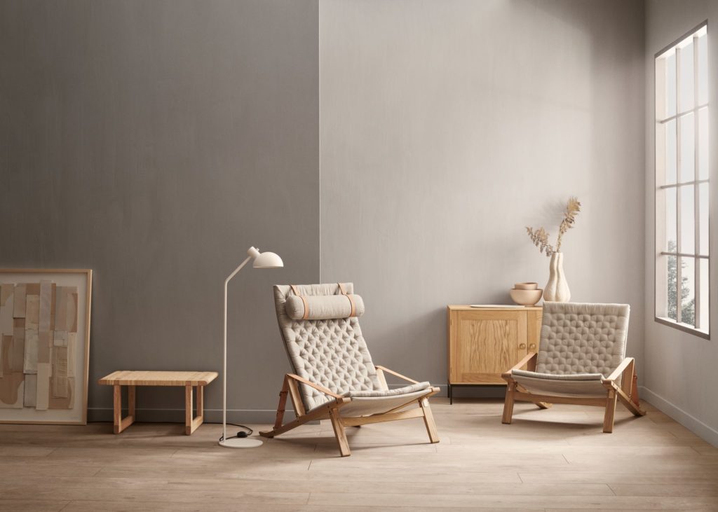 Plico chair two chairs high-back and low- in nice room with wooden furniture