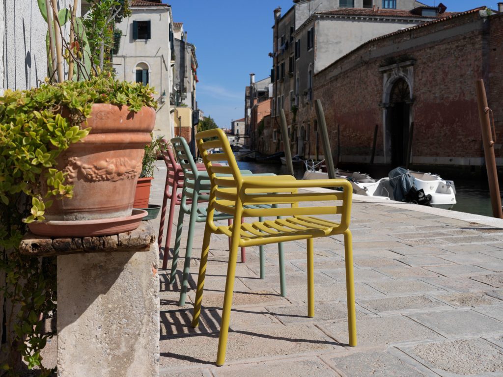 Nardi Doga chair three chairs outdoors side view