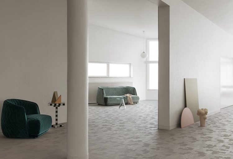 BOLON by Patricia Urquiola light in open room with sofa at far end
