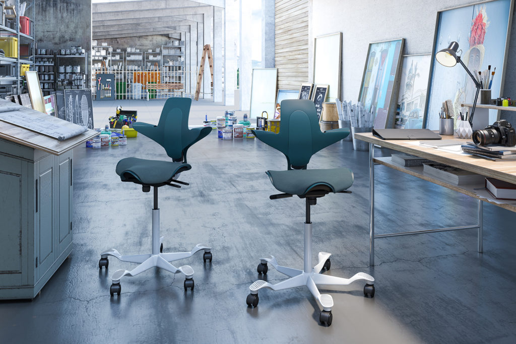 HÅG Capisco Puls two high stools in aqua in drafting room