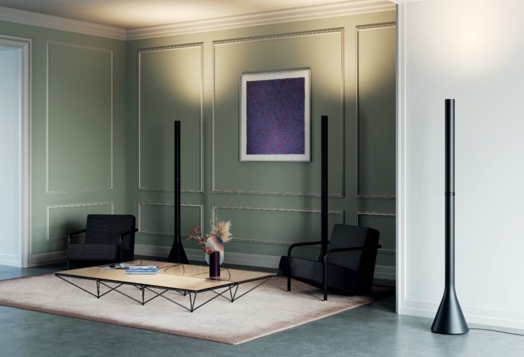 Croma three black lamps in room with green walls and white rug