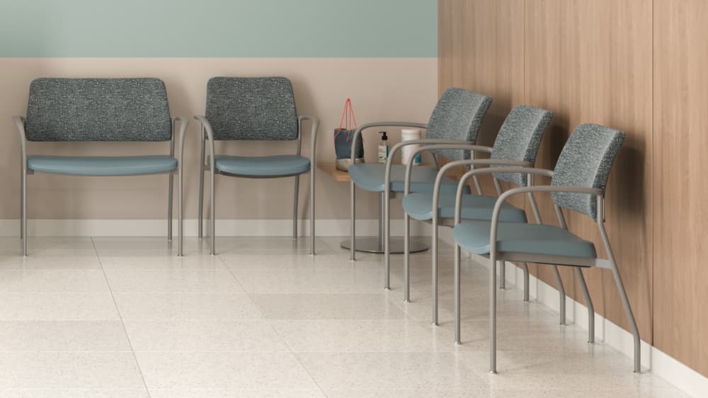 Cora side chair five chairs (four guest and one bariatric) with steel blue seat and gray tweed back in waiting area at Dr.'s office