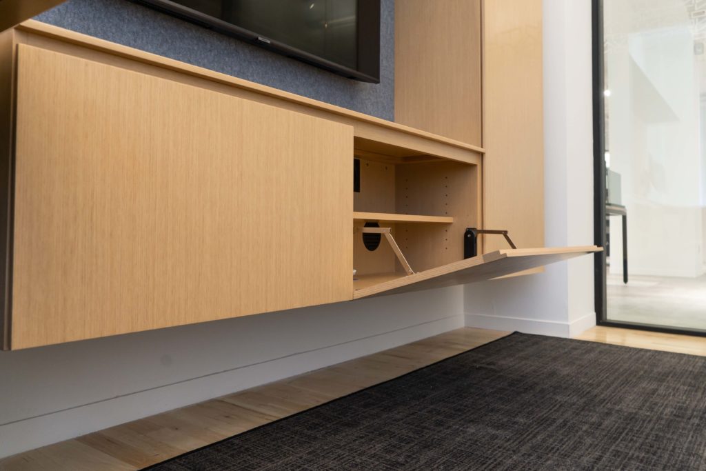 Innovant Palette medium-tone wood detail of storage feature